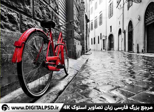 دانلود عکس با کیفیت دوچرخه قرمز در خیابان